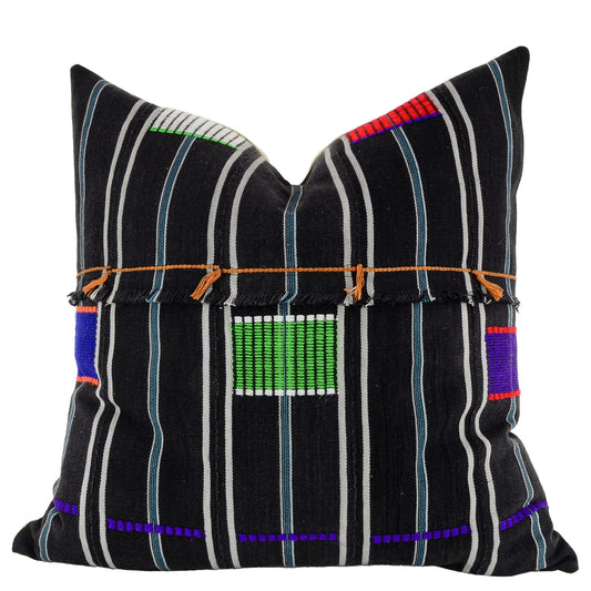 Front of pillow with black base, blue and white stripes and colorful embroidery patterns made from vintage handwoven Baoulé/Baule cotton cloth from Africa's Ivory Coast, reflecting the traditions, symbols, and tribal lives of the Baoulé/Baule people