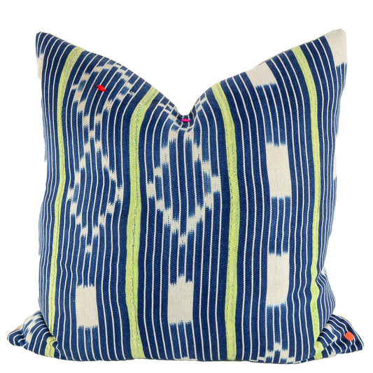Front of pillow with rich blue and white patterns, green stripes and colorful embroidery made from vintage handwoven Baoulé/Baule cotton cloth from Africa's Ivory Coast, reflecting the traditions, symbols, and tribal lives of the Baoulé/Baule people