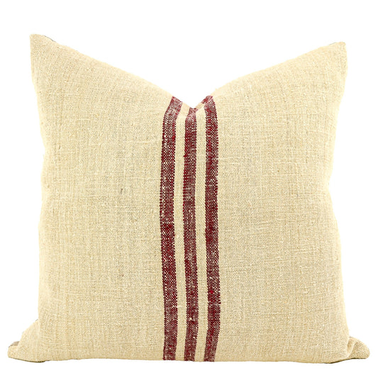 Front of pillow made from antique European grain sack natural tone linen with a deep maroon vertical stripes in the middle of the pillow