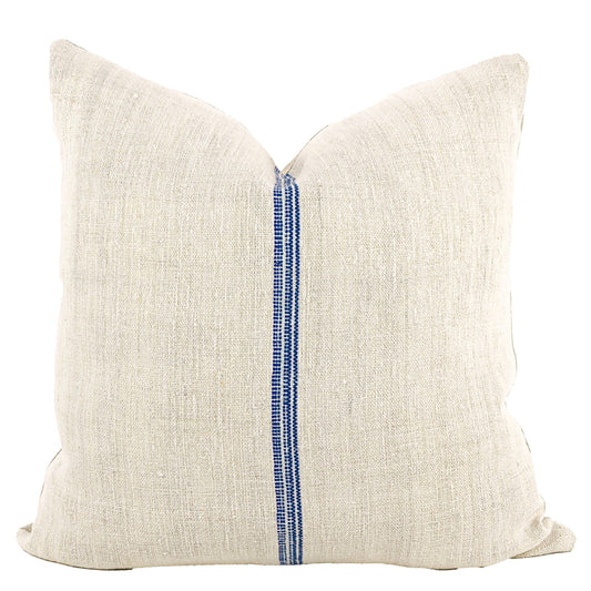 Front of pillow made from antique European grain sack natural tone linen with rich blue vertical stripes in the middle of the pillow