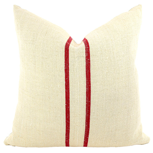 Front of pillow made from antique European grain sack natural tone linen with deep French red vertical stripes in the middle of the pillow