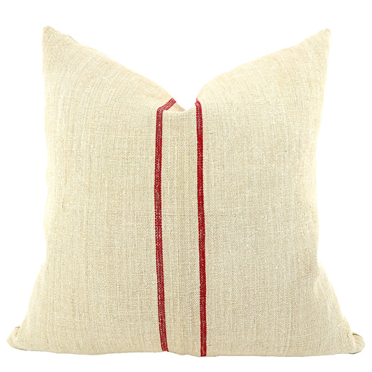 Front of pillow made from antique European grain sack natural tone linen with red vertical stripes in the middle of the pillow