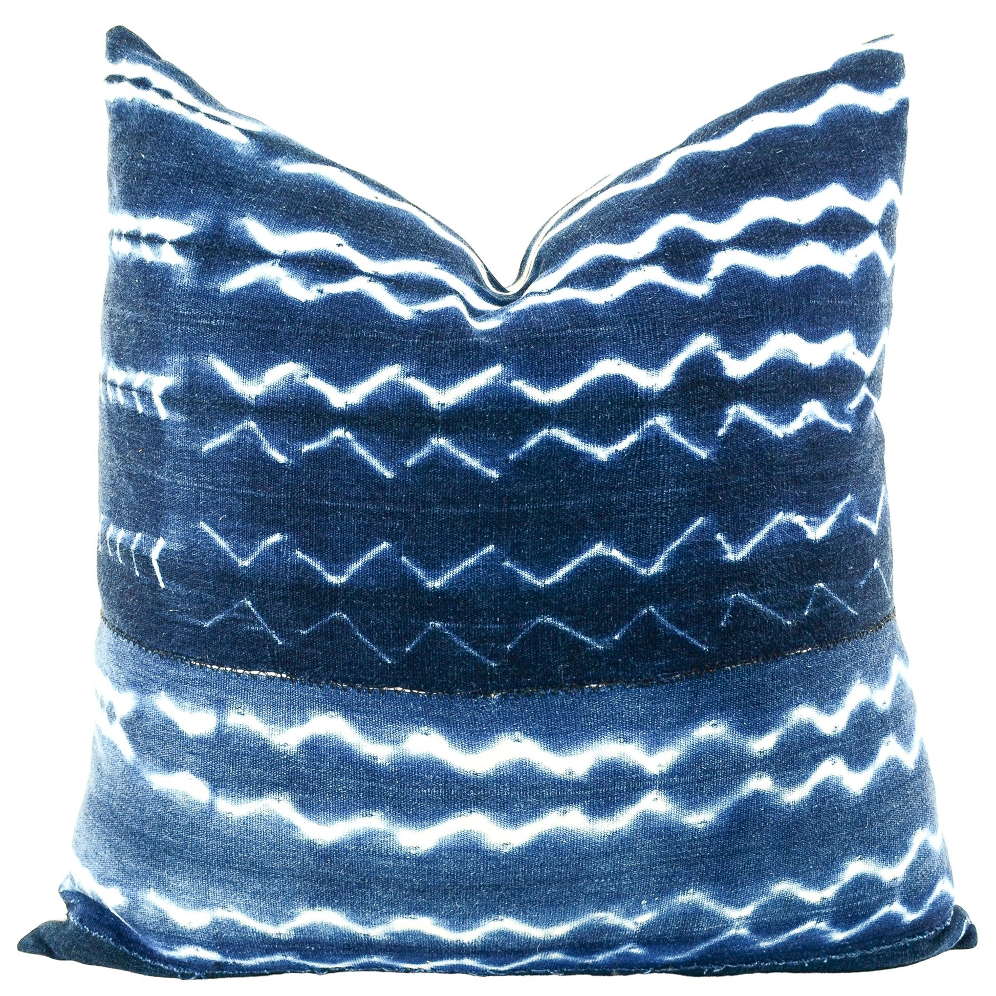 Front of pillow with rich blue and white patterns made from vintage handwoven indigo cotton cloth from Mali West Africa