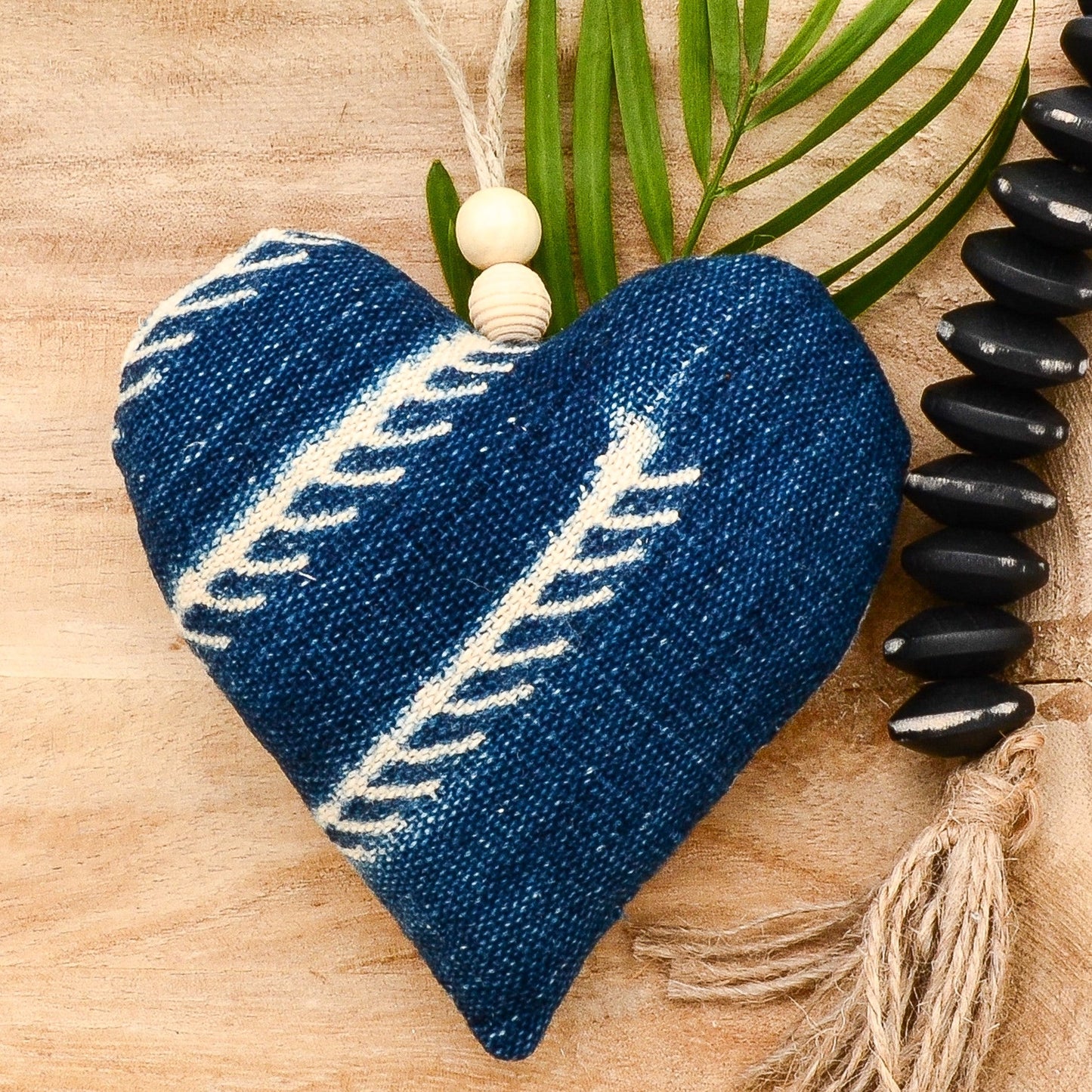 Lavender sachet heart made from vintage handwoven indigo cotton cloth from Africa, deep rich blue color with white markings , hemp twine tie with wooden beads, filled with high quality lavender from Provence France