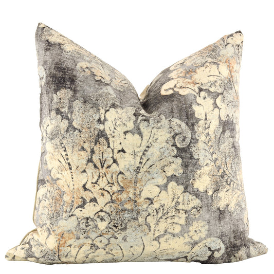 Front of pillow made from a medium-weight, linen-blend designer upholstery fabric with a stunning color combination of soft lemony light yellow flowing into smoky grays