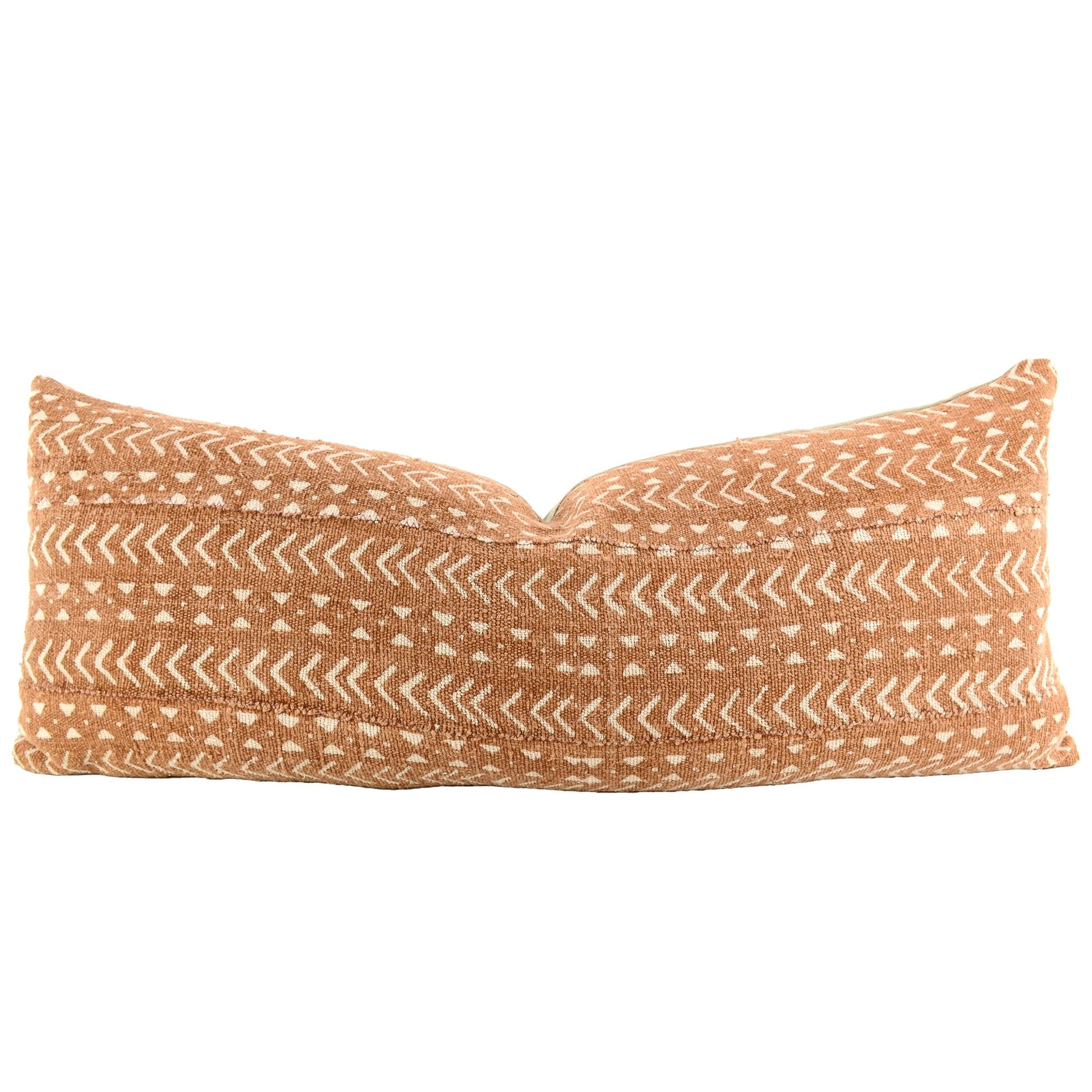 Front of pillow with rich brown and white patterns made from a traditional handwoven mudcloth textile sheet from Mali West Africa