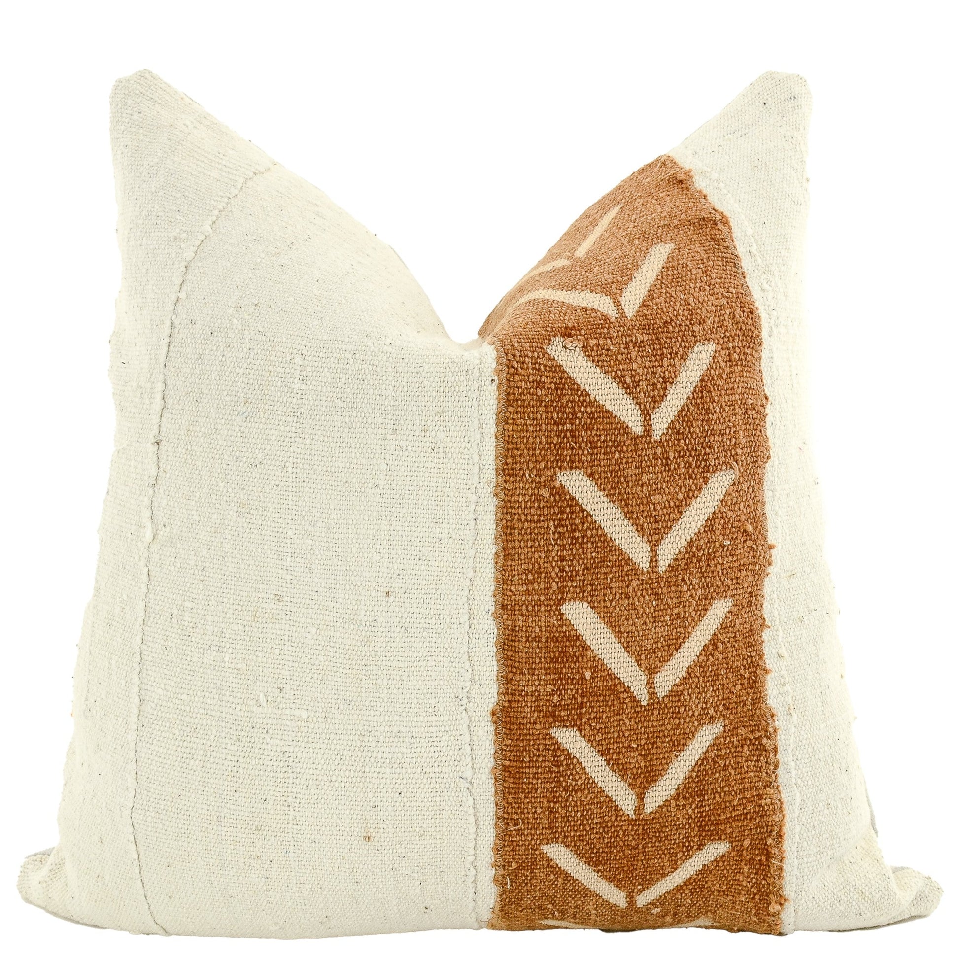 Front of pillow with rich brown and white patterns along with solid white made from two traditional handwoven mudcloth textile sheets from Mali West Africa
