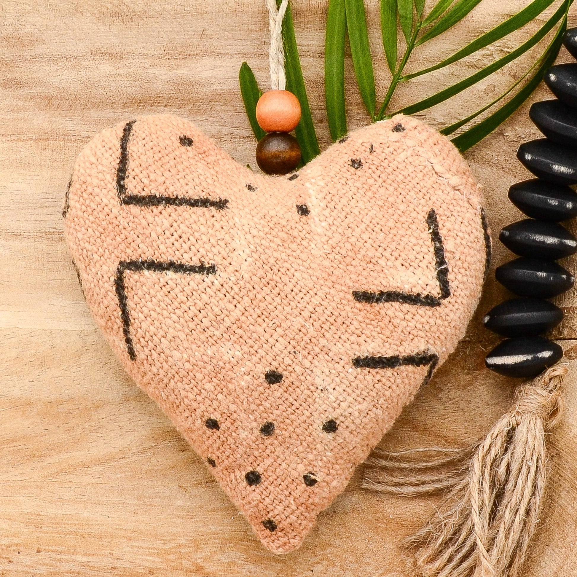 Lavender sachet heart made from handwoven  mudcloth from Africa, brown with black markings , hemp twine tie with wooden beads, filled with high quality lavender from Provence France