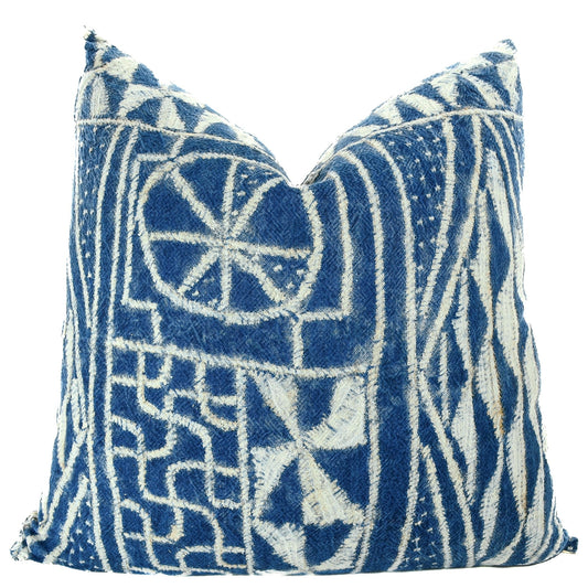 Front of pillow with rich blue and white patterns made from vintage Ndop cotton cloth by the Bamileke people from the grasslands in Cameroon Africa