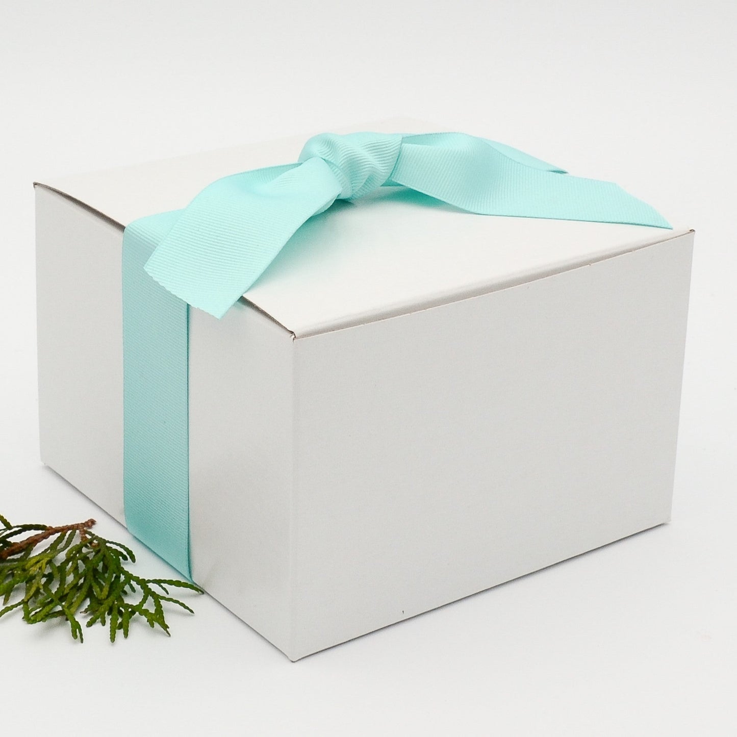 Gift box with turquoise gros grain ribbon and selection of eight greeting cards, which may be personalized