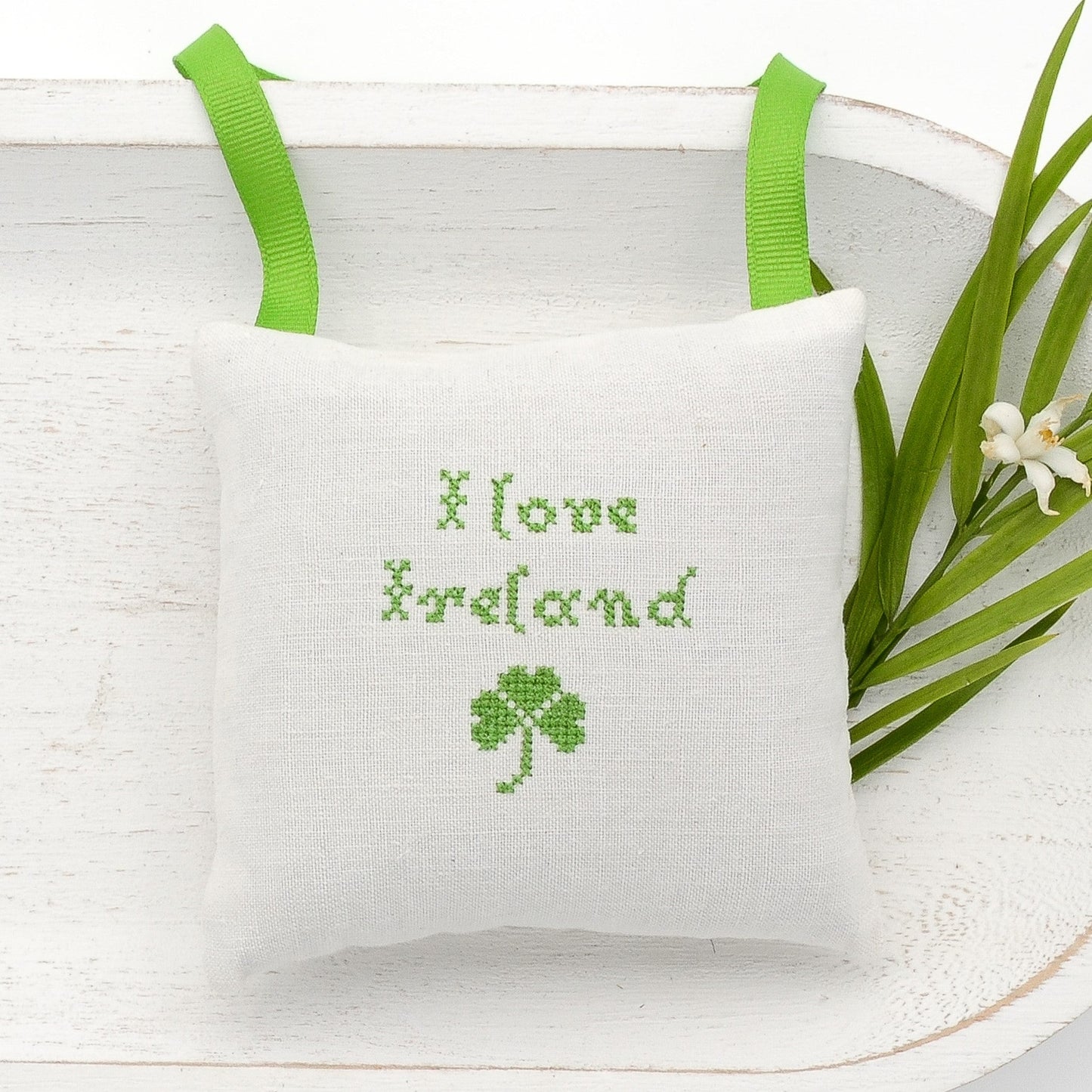 Antique European white linen lavender sachet square, "I love Ireland" embroidere in green cross stitch, green gros grain ribbon tie, filled with high quality lavender from Provence France