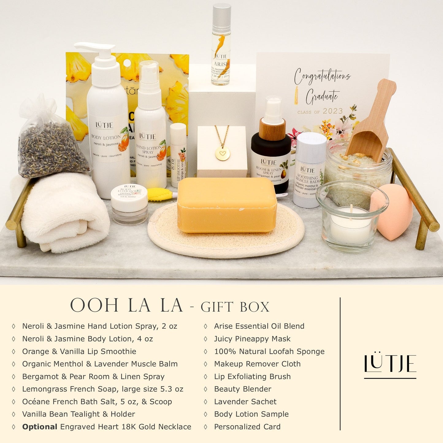 Ooh La La Gift Box for women, wife, daughter, BFF, sister, mom, or grandma, includes Neroli & Jasmine hand lotion spray and body lotion, essential oil, lip balm, soothing muscle balm, Bergamot & Pear room & linen spray, French soap, French bath salts, hydrating face mask, other bath, spa and self-care items, and optional 18K gold-plated necklace with engraved heart.
