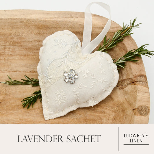 Lavender sachet heart made from antique/vintage lace, antique European white linen, vintage jewelry piece and ribbon tie, and filled with high quality lavender from Provence France
