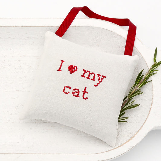 Antique European white linen lavender sachet square, "I love my cat" embroidered in red cross stitch, red gros grain ribbon tie, filled with high quality lavender from Provence France