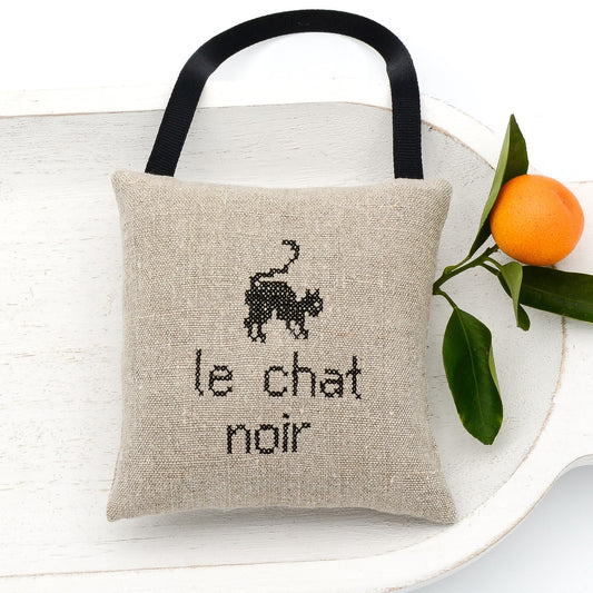 Vintage German mangle cloth natural tone linen lavender sachet square, "Le chat noir" and cat embroidered in black cross stitch, black gros grain ribbon tie, filled with high quality lavender from Provence France