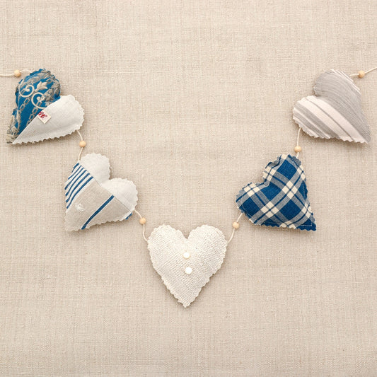 Vintage French fabric garland, five colorful hearts, white cotton twine and wooden beads between hearts