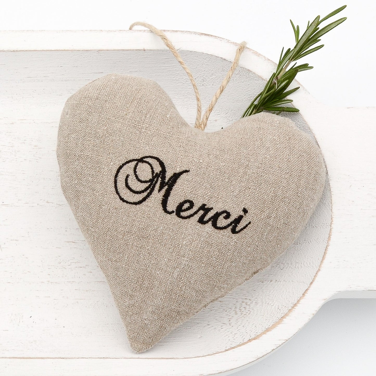 Vintage German mangle cloth natural tone linen lavender sachet heart, "Merci" embroidered in black satin stitch, hemp twine tie, filled with high quality lavender from Provence France