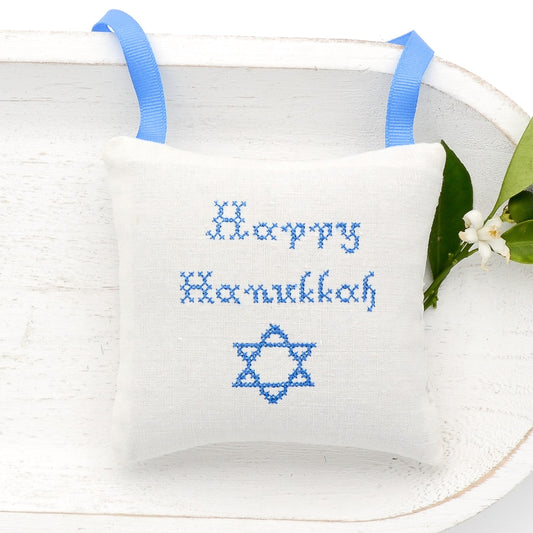 Antique European white linen lavender sachet square, "Happy Hanukkah" and Star of David embroidered in blue cross stitch, blue gros grain ribbon tie, filled with high quality lavender from Provence France