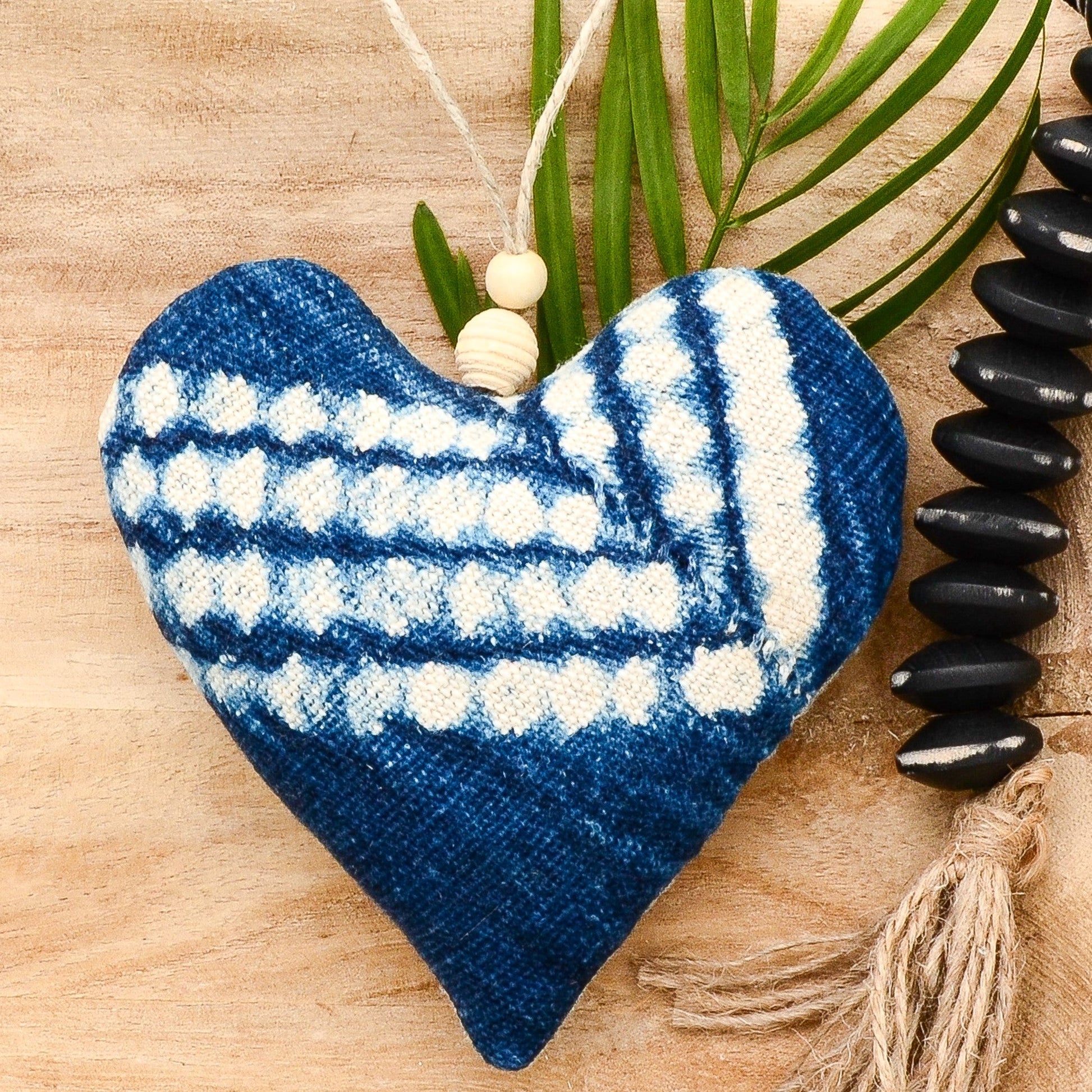 Lavender sachet heart made from vintage handwoven indigo cotton cloth from Africa, deep rich blue color with white markings , hemp twine tie with wooden beads, filled with high quality lavender from Provence France