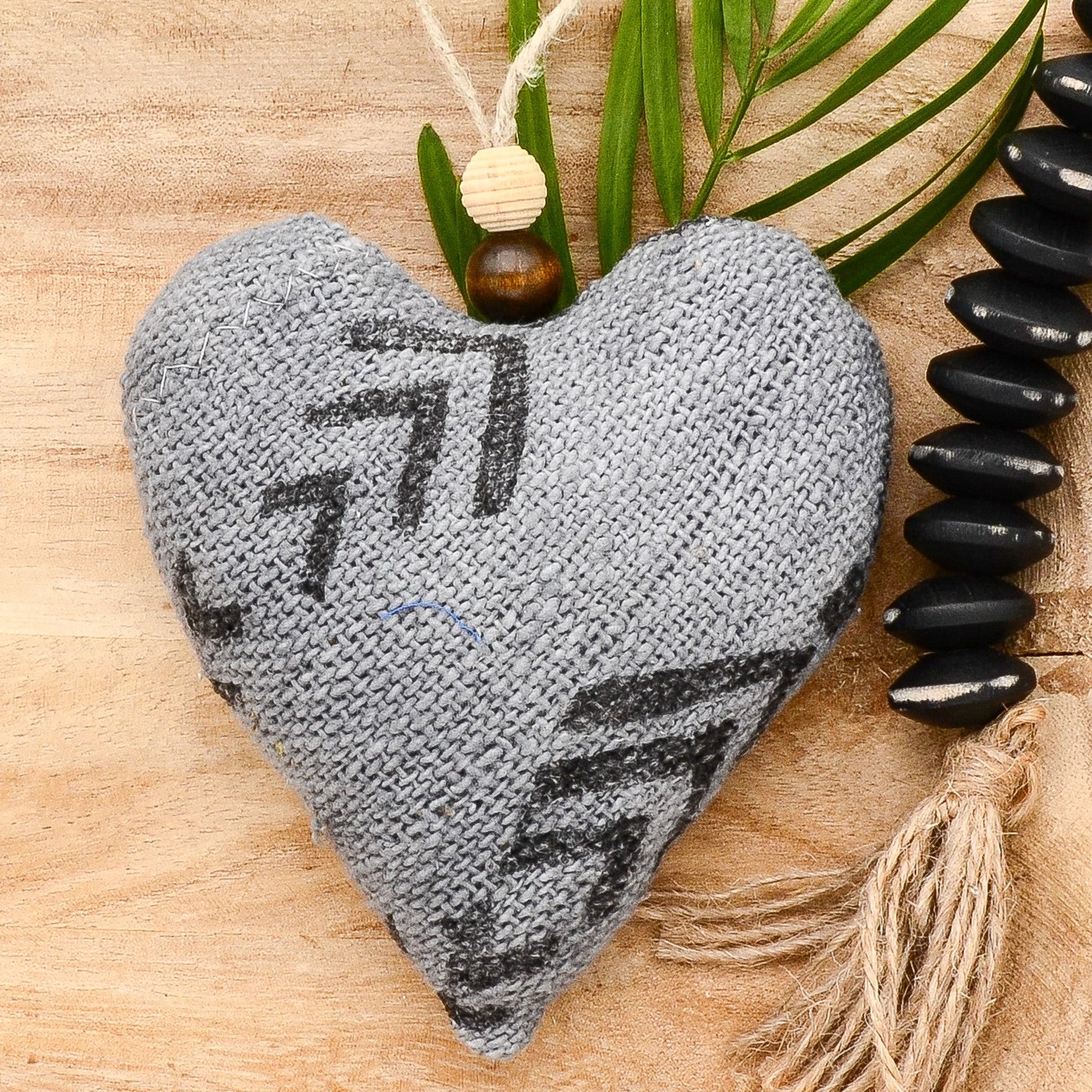 Lavender sachet heart made from handwoven  mudcloth from Africa, gray with black markings , hemp twine tie with wooden beads, filled with high quality lavender from Provence France