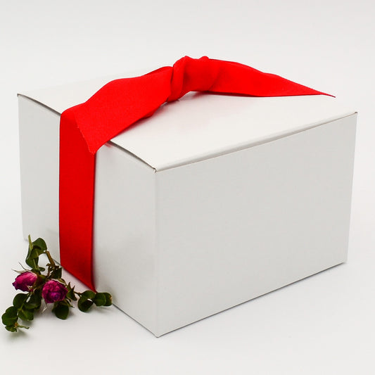 Gift box with red gros grain ribbon and selection of eight greeting cards, which may be personalized