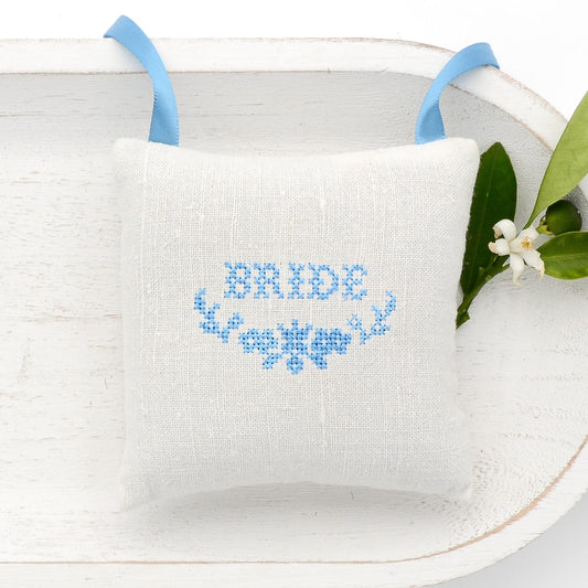 Antique European white linen lavender sachet square, "Bride" and garland embroidered in blue cross stitch, blue satin ribbon tie, filled with high quality lavender from Provence France