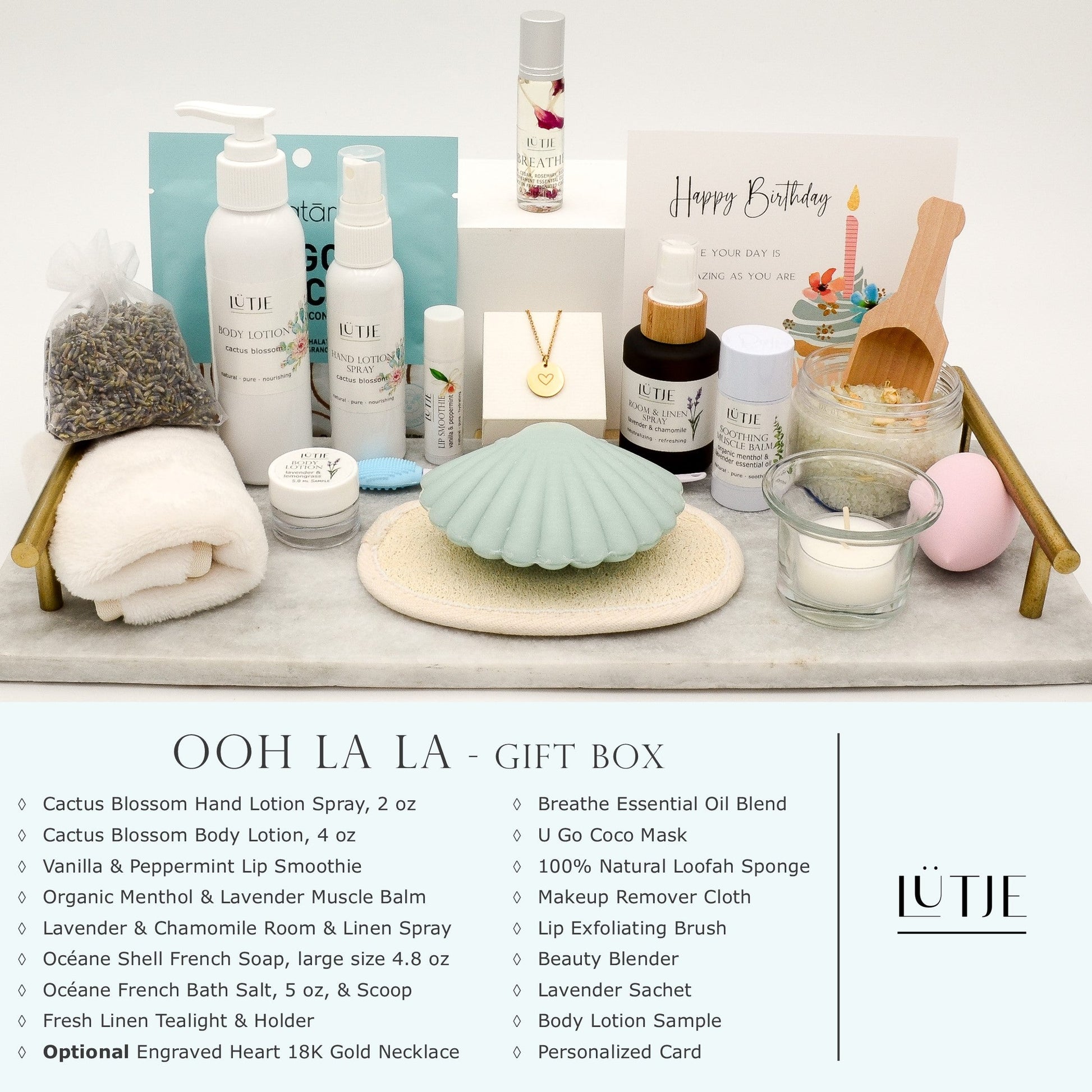 Ooh La La Gift Box for women, wife, daughter, BFF, sister, mom, or grandma, includes Cactus Blossom hand lotion spray and body lotion, essential oil, lip balm, soothing muscle balm, Lavender & Chamomile room & linen spray, French soap, French bath salts, hydrating face mask, other bath, spa and self-care items, and 18K gold-plated necklace with engraved heart.