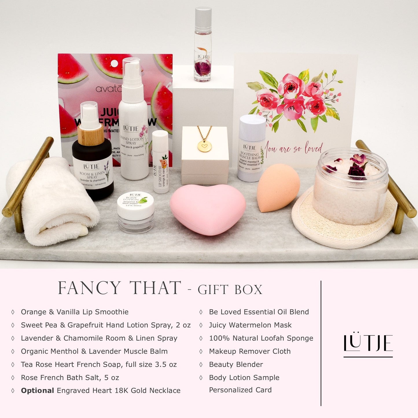 Fancy That Gift Box for women, BFF, wife, daughter, sister, mom, or grandma, includes Sweet Pea & Grapefruit hand lotion spray, essential oil, lip balm, soothing muscle balm, Lavender & Chamomile room & linen spray, French soap, French bath salts, hydrating face mask, other bath, spa and self-care items, and 18K gold-plated necklace with engraved heart.