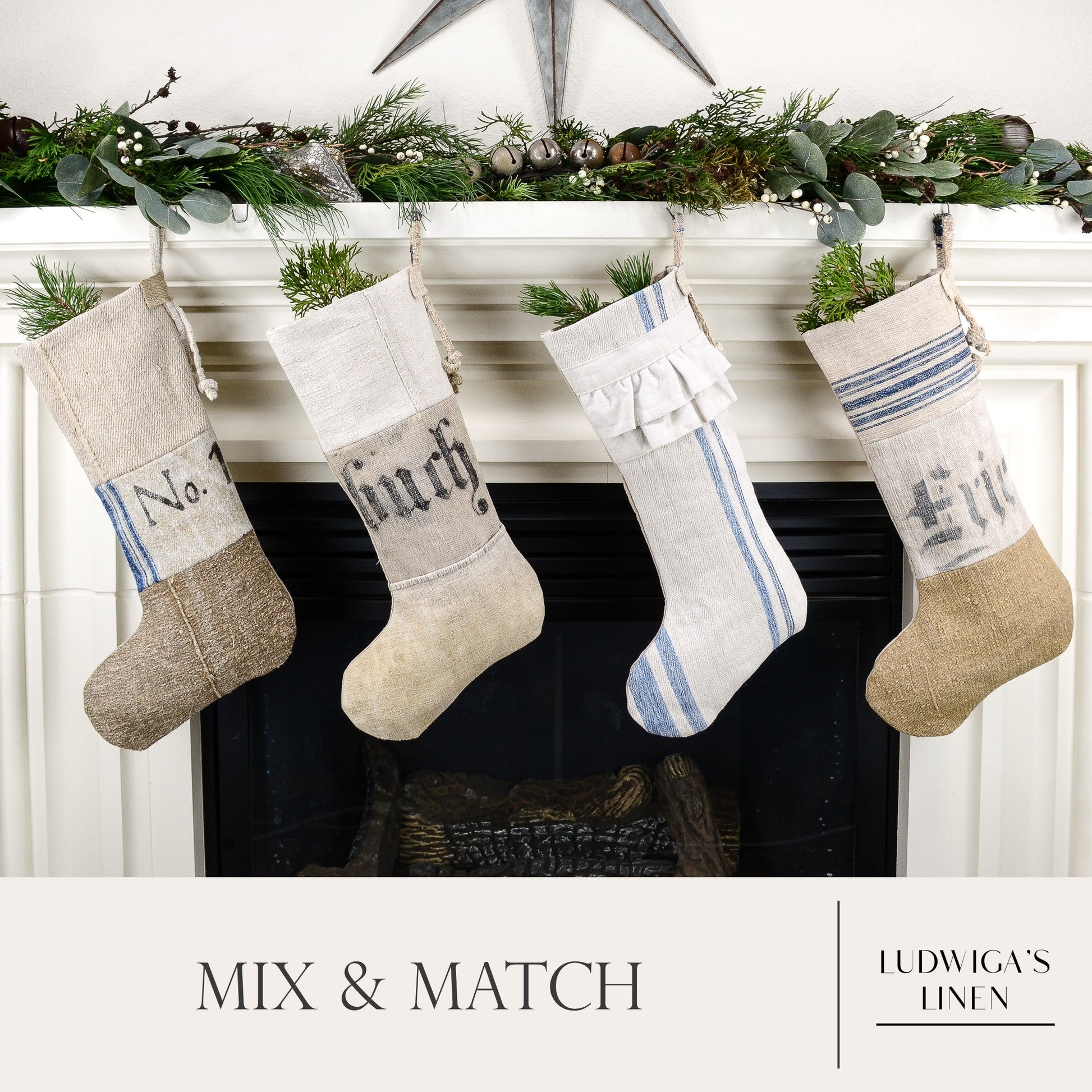 Group of four Christmas stockings hanging on fireplace