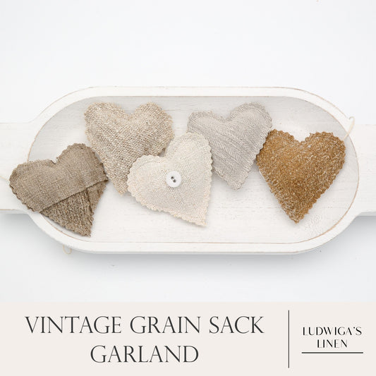 Vintage European grain sack linen garland, five hearts on white cotton or hemp twine