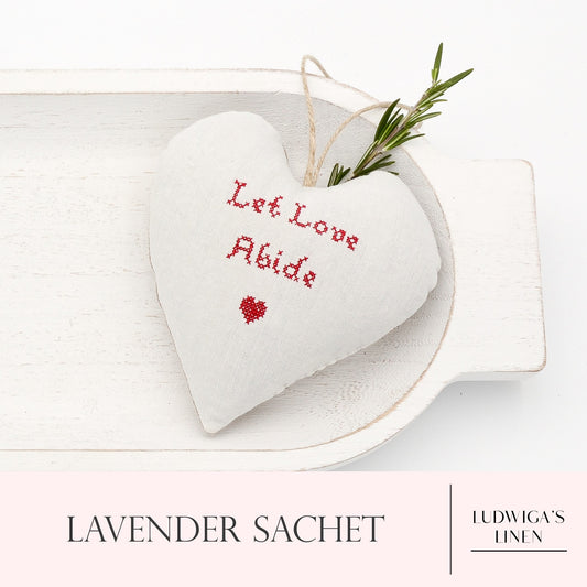 Antique/vintage European white linen lavender sachet heart with "let love abide" embroidered in red, hemp twine tie and filled with high quality lavender from Provence France