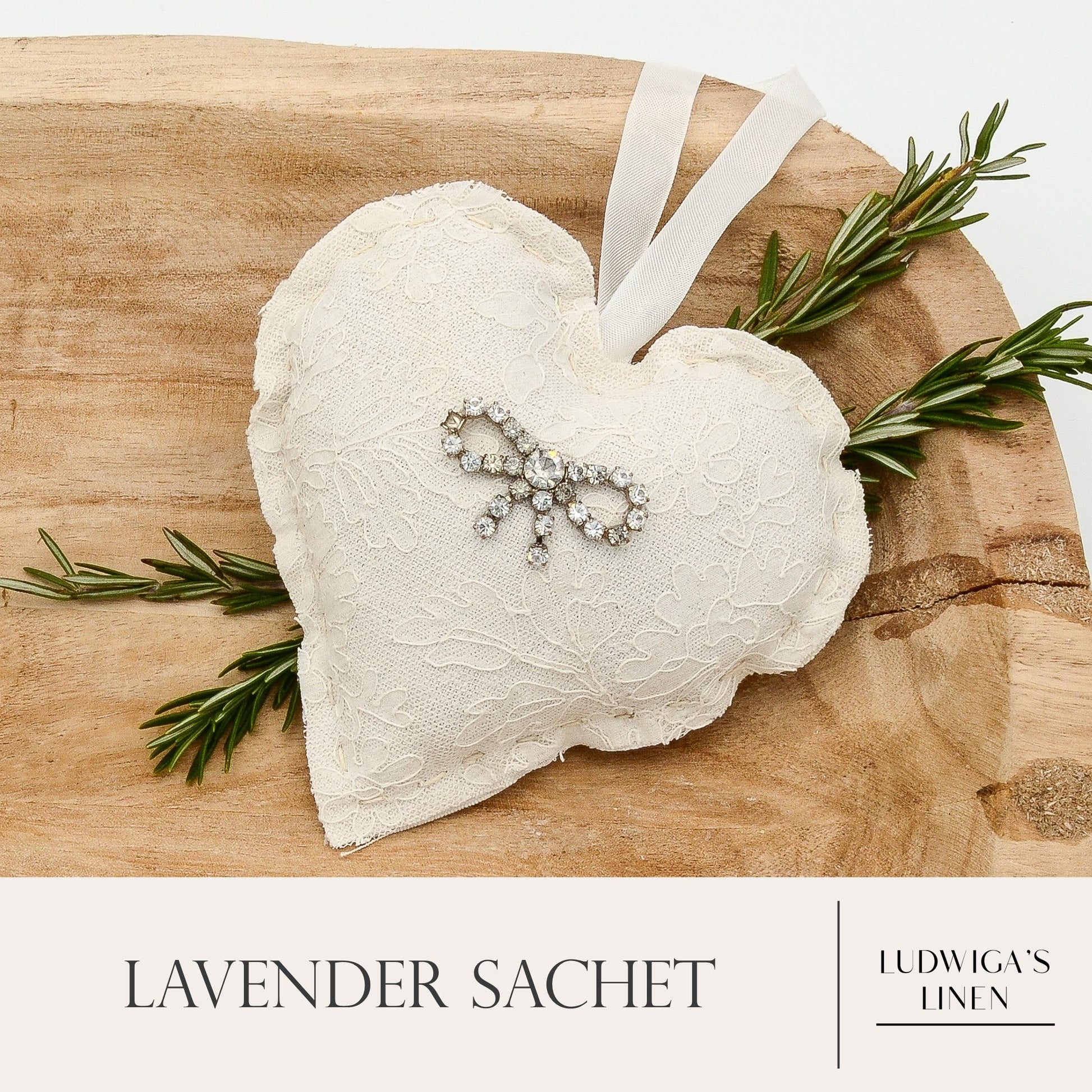 Lavender sachet heart made from antique/vintage lace, antique European white linen, vintage jewelry piece and ribbon tie, and filled with high quality lavender from Provence France