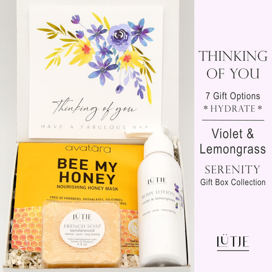 Gift Boxes for women, wife, daughter, BFF, sister, mom, or grandma, includes Violet & Lemongrass hand lotion spray and body lotion, essential oil, lip balm, soothing muscle balm, Bergamot & Pear room & linen spray, French soap, French bath salts, hydrating face mask, other bath, spa and self-care items, and 18K gold-plated necklace with engraved heart.