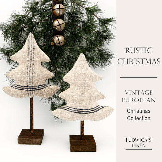 Christmas/holiday ornament - two antique European grain sack linen trees, each on a dark brown stained wooden stand